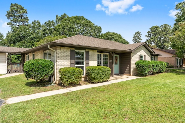 32047 S Wiggins St, Magnolia, TX 77355 - single story home featuring brick siding, a front lawn, and roof with shingles