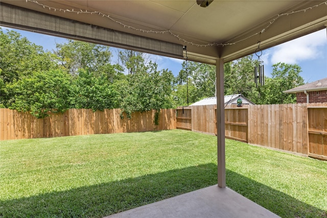 18715 Deer Trace Dr, Crosby, TX 77532 - fenced backyard with a patio