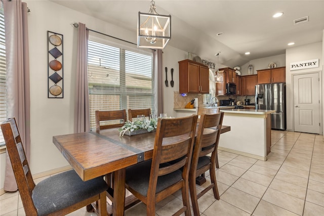 18715 Deer Trace Dr, Crosby, TX 77532 - dining space with a chandelier, light tile patterned flooring, vaulted ceiling, and recessed lighting