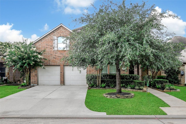 14314 Prosper Ridge Dr, Cypress, TX 77429 - view of front of house featuring brick siding, a front lawn, an attached garage, and driveway