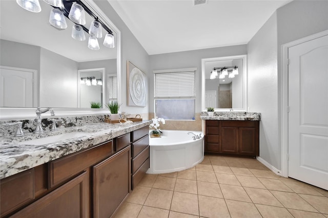 14314 Prosper Ridge Dr, Cypress, TX 77429 - full bathroom featuring vanity, tile patterned flooring, and a bath