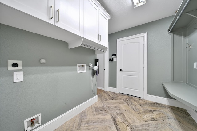 14314 Prosper Ridge Dr, Cypress, TX 77429 - laundry area with hookup for an electric dryer, cabinet space, and washer hookup