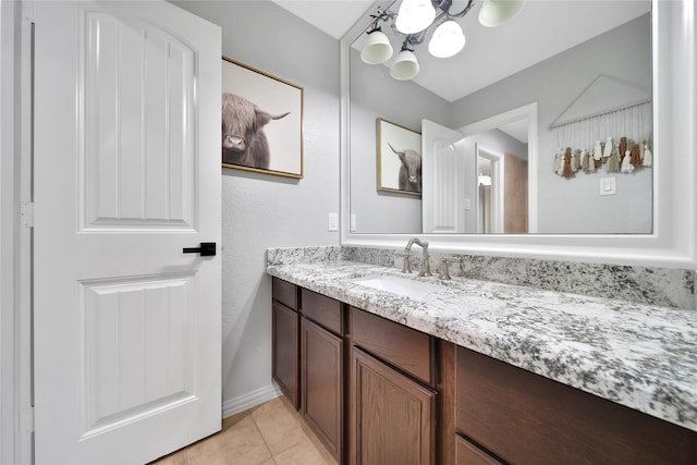 14314 Prosper Ridge Dr, Cypress, TX 77429 - bathroom with vanity, a chandelier, and tile patterned floors