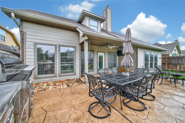14314 Prosper Ridge Dr, Cypress, TX 77429 - view of patio / terrace featuring outdoor dining space and ceiling fan