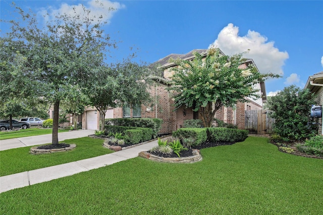 14314 Prosper Ridge Dr, Cypress, TX 77429 - view of front facade with brick siding, concrete driveway, and an attached garage