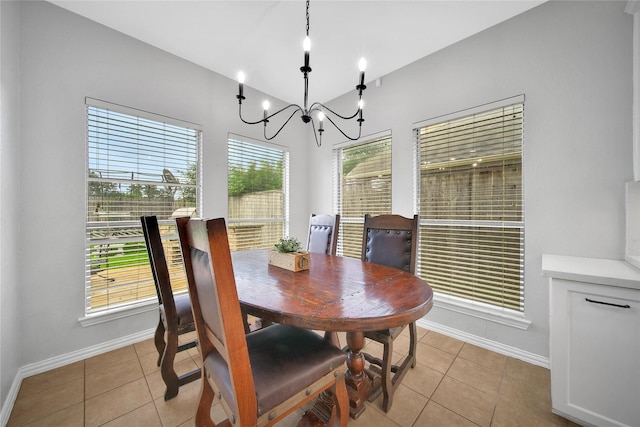14314 Prosper Ridge Dr, Cypress, TX 77429 - dining area with light tile patterned floors and a chandelier