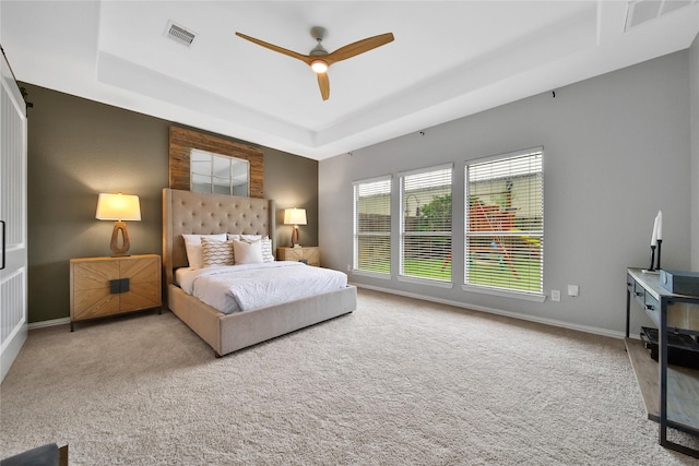14314 Prosper Ridge Dr, Cypress, TX 77429 - bedroom with a tray ceiling, carpet, and a ceiling fan