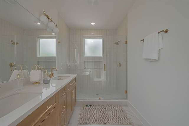 776 Mansfield St, Houston, TX 77091 - full bathroom featuring a stall shower, double vanity, and healthy amount of natural light