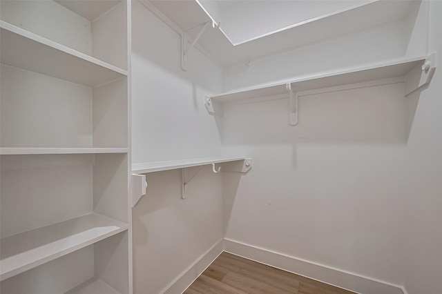 776 Mansfield St, Houston, TX 77091 - walk in closet with wood finished floors