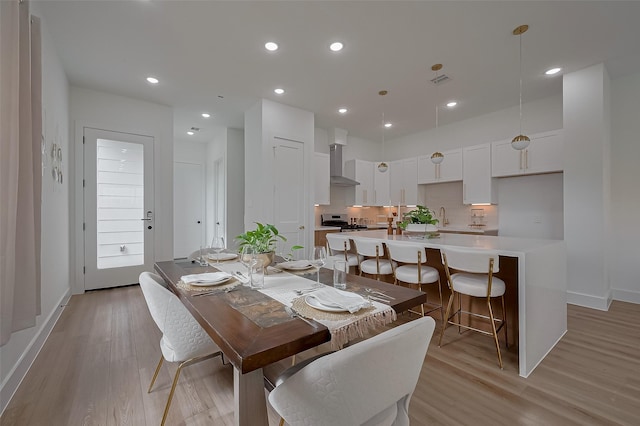 776 Mansfield St, Houston, TX 77091 - dining space featuring light wood-type flooring and recessed lighting