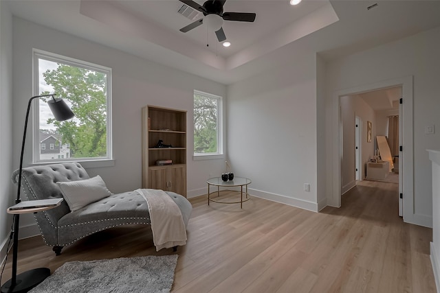 776 Mansfield St, Houston, TX 77091 - bedroom with a tray ceiling, light wood-style floors, and recessed lighting