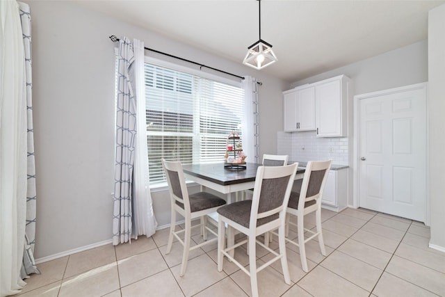 18914 Woodglen Shadows Dr, Humble, TX 77346 - dining room with light tile patterned floors