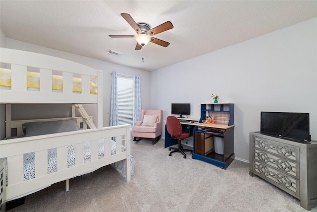 18914 Woodglen Shadows Dr, Humble, TX 77346 - bedroom featuring light colored carpet, a desk, and ceiling fan