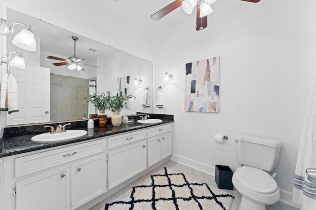 2909 Arbor St, Houston, TX 77004 - bathroom featuring ceiling fan, double vanity, tiled shower, and tile patterned flooring