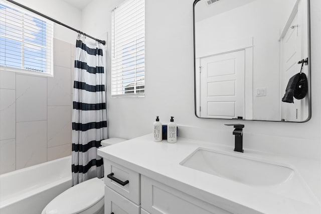 2213 Springwood Vista Ln, Houston, TX 77055 - bathroom featuring vanity, plenty of natural light, and shower / bath combo