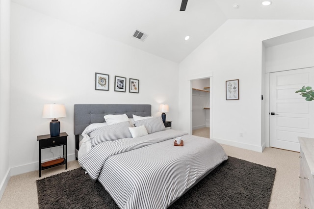 2213 Springwood Vista Ln, Houston, TX 77055 - bedroom with light carpet, recessed lighting, a spacious closet, a ceiling fan, and high vaulted ceiling