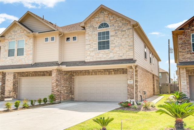527 Dr Martin Luther King Jr Dr Unit D, La Porte, TX 77571 - townhome / multi-family property with a garage, driveway, and brick siding