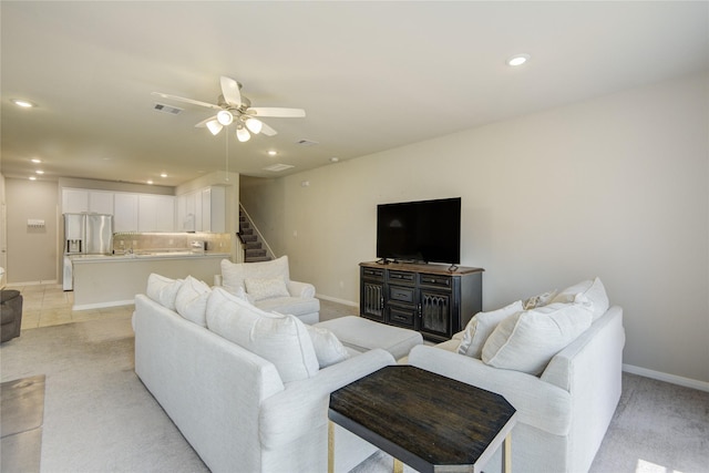 527 Dr Martin Luther King Jr Dr Unit D, La Porte, TX 77571 - living room with light carpet, a ceiling fan, recessed lighting, and stairs