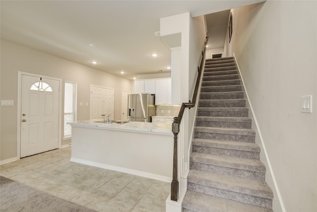527 Dr Martin Luther King Jr Dr Unit D, La Porte, TX 77571 - staircase featuring recessed lighting and tile patterned flooring