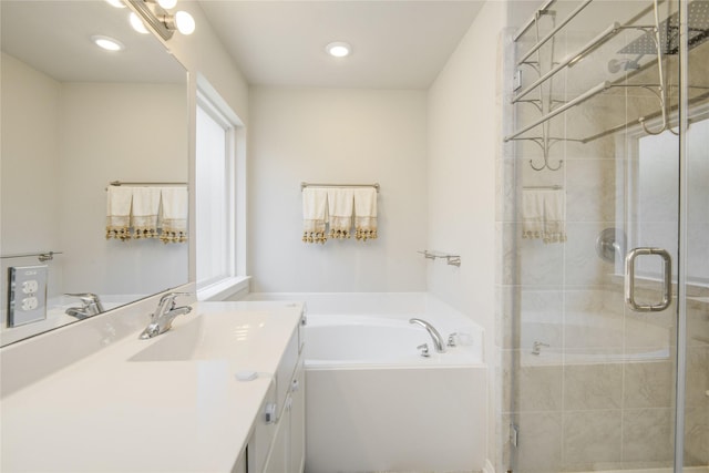 527 Dr Martin Luther King Jr Dr Unit D, La Porte, TX 77571 - bathroom featuring vanity, a garden tub, and a shower stall