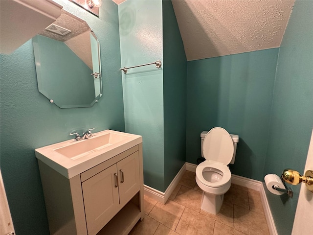 12807 Stratford Heights Dr, Sugar Land, TX 77498 - bathroom featuring vanity, tile patterned flooring, a textured ceiling, and lofted ceiling