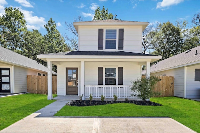 16515 Jasmine Marie Pl, Conroe, TX 77306 - american foursquare style home featuring a porch and a shingled roof