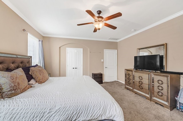 19443 Alton Springs Dr, Cypress, TX 77433 - carpeted bedroom with ornamental molding, ceiling fan, and a closet