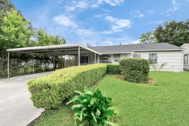 9417 Fairland Dr, Houston, TX 77051 - back of property with driveway and an attached carport