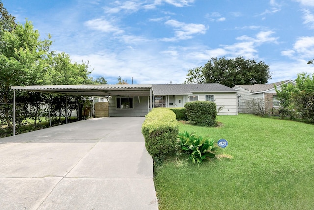 9417 Fairland Dr, Houston, TX 77051 - ranch-style home with concrete driveway and a carport
