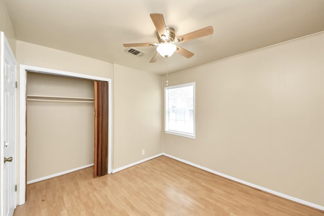 9417 Fairland Dr, Houston, TX 77051 - unfurnished bedroom featuring light wood finished floors, a closet, and ceiling fan