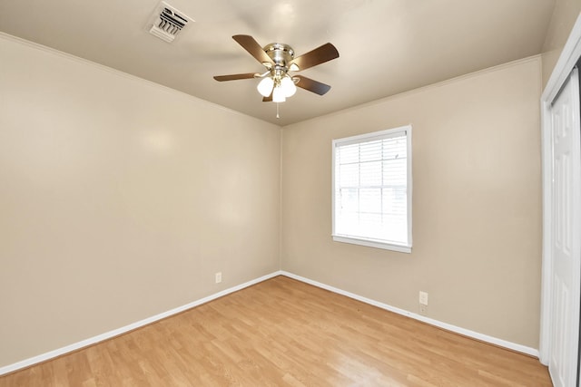 9417 Fairland Dr, Houston, TX 77051 - unfurnished bedroom featuring light wood-style floors, crown molding, a closet, and a ceiling fan