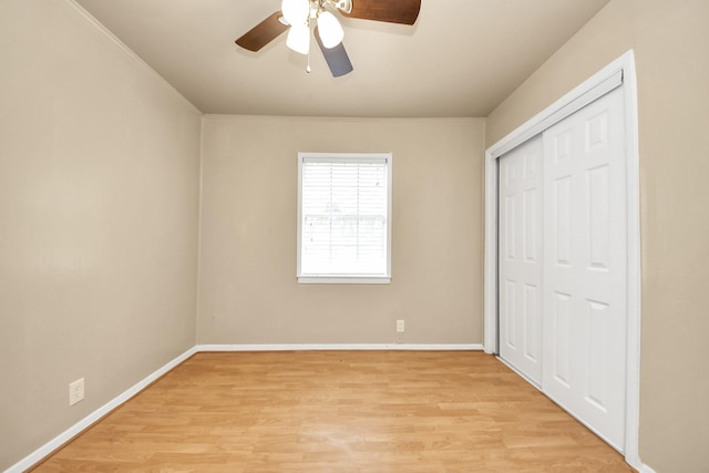 9417 Fairland Dr, Houston, TX 77051 - unfurnished bedroom with light wood finished floors, a closet, a ceiling fan, and crown molding