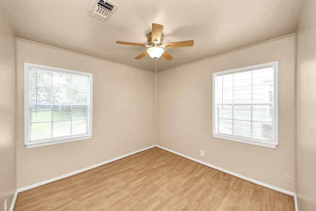 9417 Fairland Dr, Houston, TX 77051 - spare room featuring light wood finished floors, a ceiling fan, and crown molding