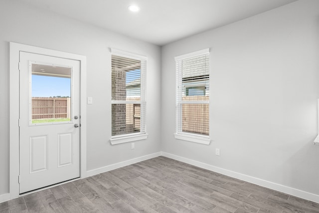 11102 Gardenia Creek Dr, Houston, TX 77044 - foyer featuring wood finished floors and recessed lighting