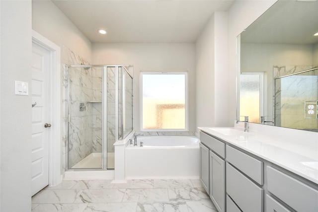11102 Gardenia Creek Dr, Houston, TX 77044 - bathroom with a garden tub, a marble finish shower, marble finish floors, double vanity, and recessed lighting