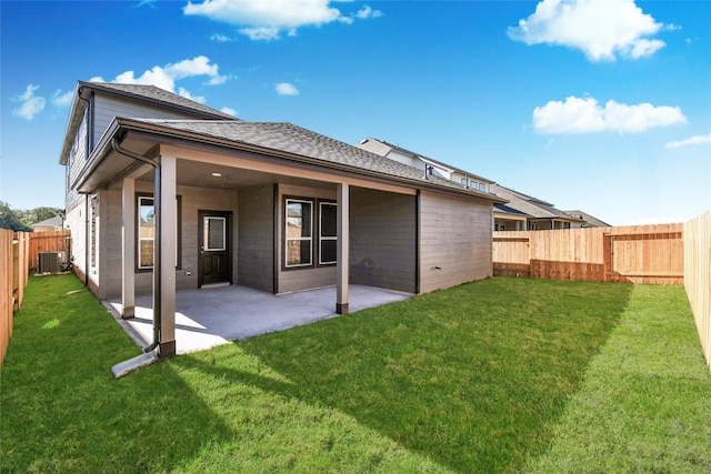 11102 Gardenia Creek Dr, Houston, TX 77044 - rear view of property with a fenced backyard, a shingled roof, and a patio