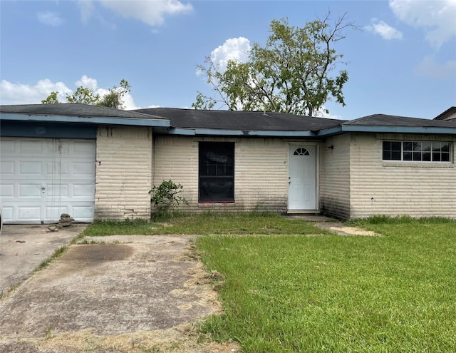 814 Deercrest St, Channelview, TX 77530 - view of front of property with brick siding, a front lawn, and a garage