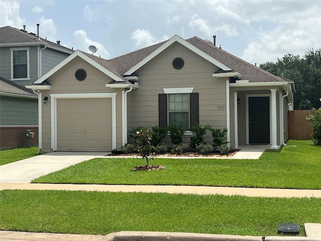 9515 Lower Ridgeway, Houston, TX 77075 - view of front of home featuring concrete driveway, roof with shingles, and a garage