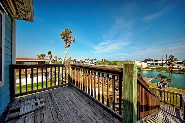 713 Copano Cove Rd, Rockport, TX 78382 - wooden deck featuring a water view