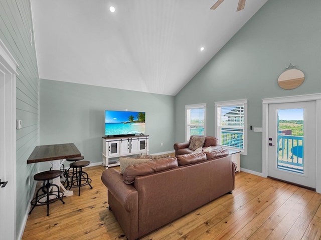 1032 Sunset Cir W, Crystal Beach, TX 77650 - living room with high vaulted ceiling, hardwood / wood-style floors, a ceiling fan, and recessed lighting