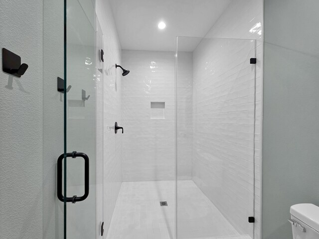 1032 Sunset Cir W, Crystal Beach, TX 77650 - bathroom featuring a shower stall