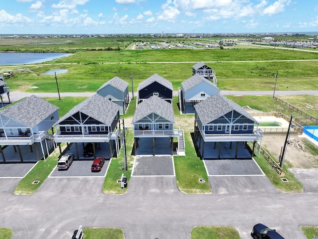 1032 Sunset Cir W, Crystal Beach, TX 77650 - drone / aerial view of a large body of water
