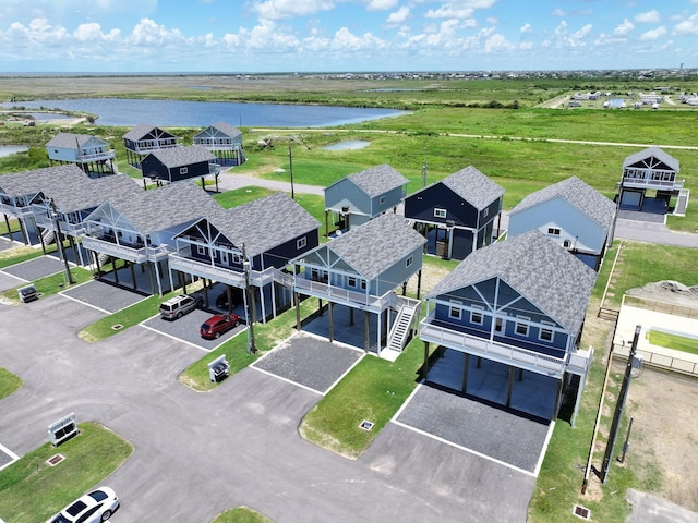 1032 Sunset Cir W, Crystal Beach, TX 77650 - aerial perspective of suburban area featuring a nearby body of water