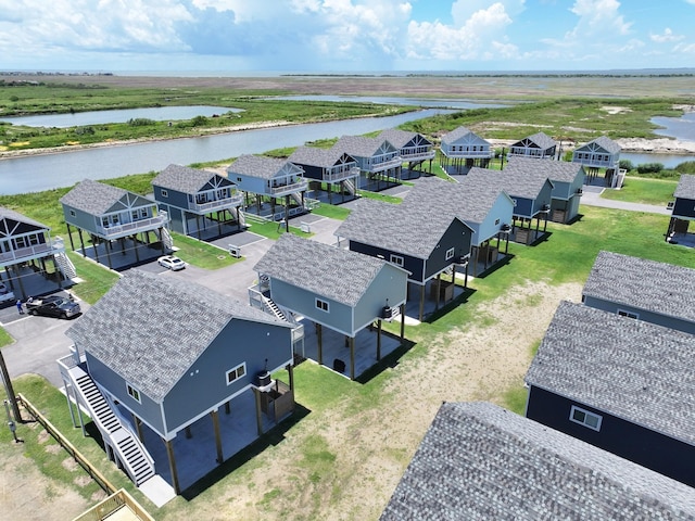 1032 Sunset Cir W, Crystal Beach, TX 77650 - aerial view of residential area featuring a large body of water