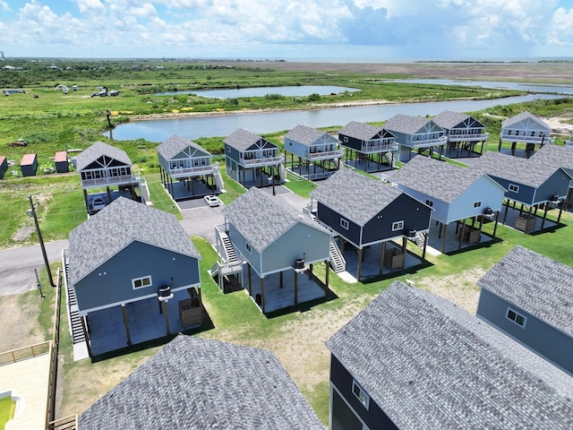 1032 Sunset Cir W, Crystal Beach, TX 77650 - aerial view of residential area with a large body of water