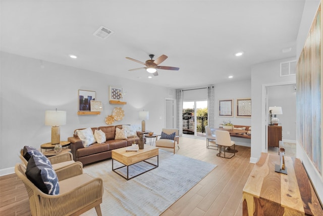 6804 Westview Dr Unit 3104, Houston, TX 77055 - living area with light wood-style floors, ceiling fan, and recessed lighting