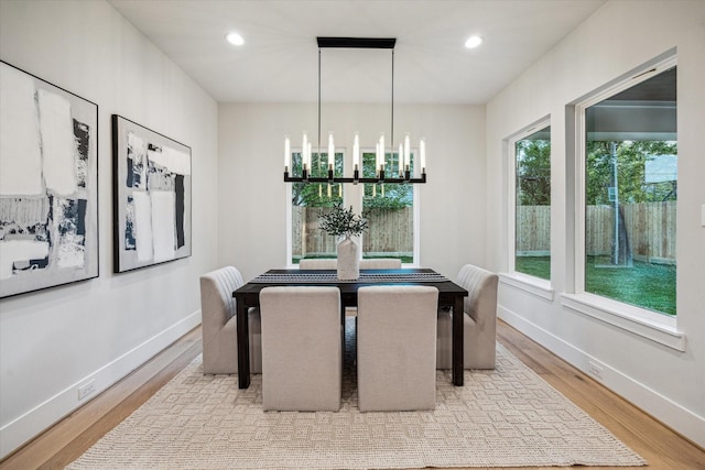 608 E 25th St, Houston, TX 77008 - dining room with light wood-type flooring, a chandelier, and recessed lighting