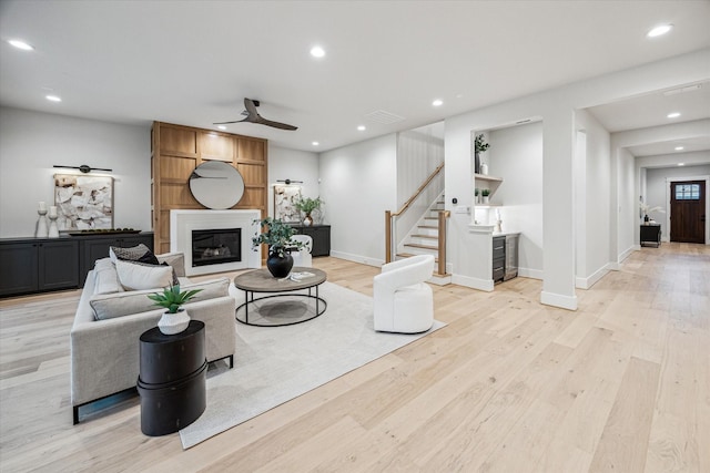 608 E 25th St, Houston, TX 77008 - living area with ceiling fan, light wood-type flooring, stairway, recessed lighting, and a large fireplace