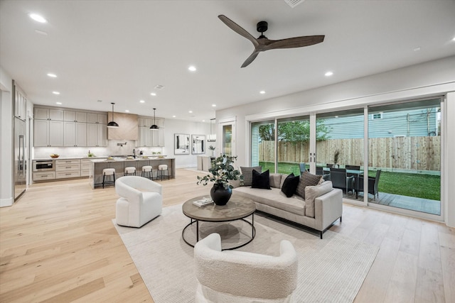 608 E 25th St, Houston, TX 77008 - living room featuring light wood-style flooring, recessed lighting, and ceiling fan