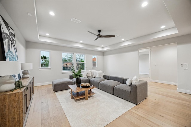 608 E 25th St, Houston, TX 77008 - living room with a raised ceiling, light wood-style floors, recessed lighting, and ceiling fan